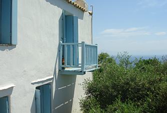 View of the side of the villa and Bedroom 1 Baclony from Rear Terrace